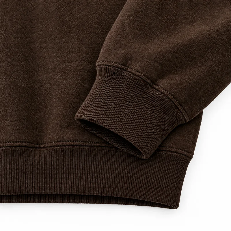 Ribbed cuff and hem of the Espresso hoodie